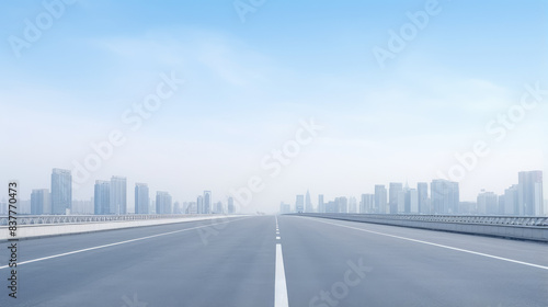 Empty Road Leading to Modern City Skyline © evening_tao