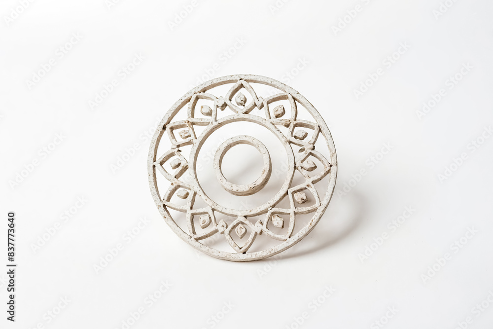 White Decorative Ornament with Intricate Pattern White Decorative Ornament with Intricate Pattern