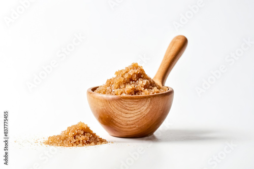 Brown sugar in wooden bowl photo