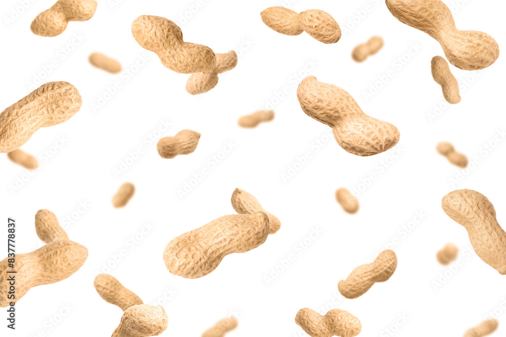 Unpeeled peanuts in air on white background Unpeeled peanuts in air on white background