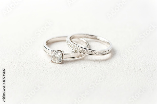 Close up of a wedding ring set on a white background