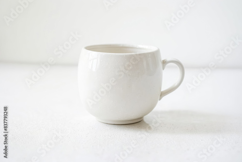 White Mug on a White Background © Rysak