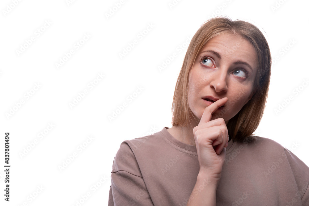 European woman with blond thin hair is worried about a problem European woman with blond thin hair is worried about a problem