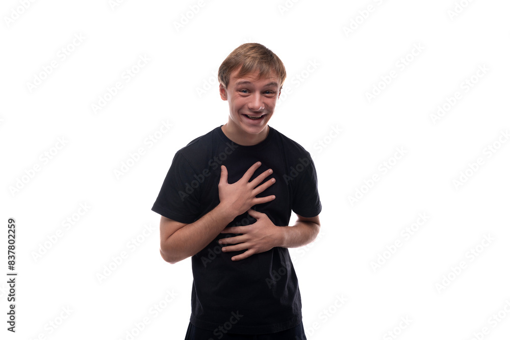 Satisfied Caucasian fair-haired teenager guy is happy Satisfied Caucasian fair-haired teenager guy is happy