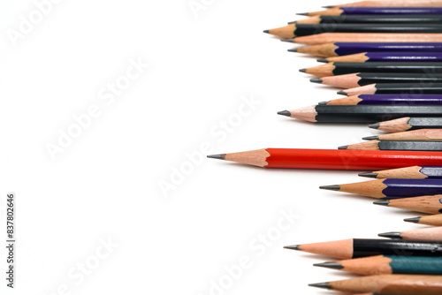 stack of pencils with selective focus on red pencil represent leadership and differentiation concept