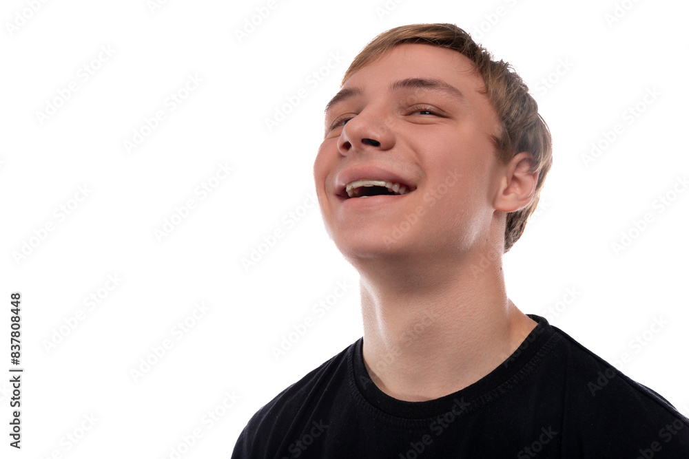 Obraz premium Headshot portrait of a blond teenager young man with short hair