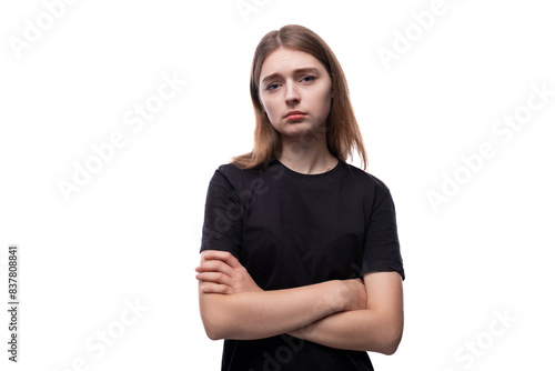 Headshot portrait of an insecure European teenage girl with brown hair © Ivan Traimak