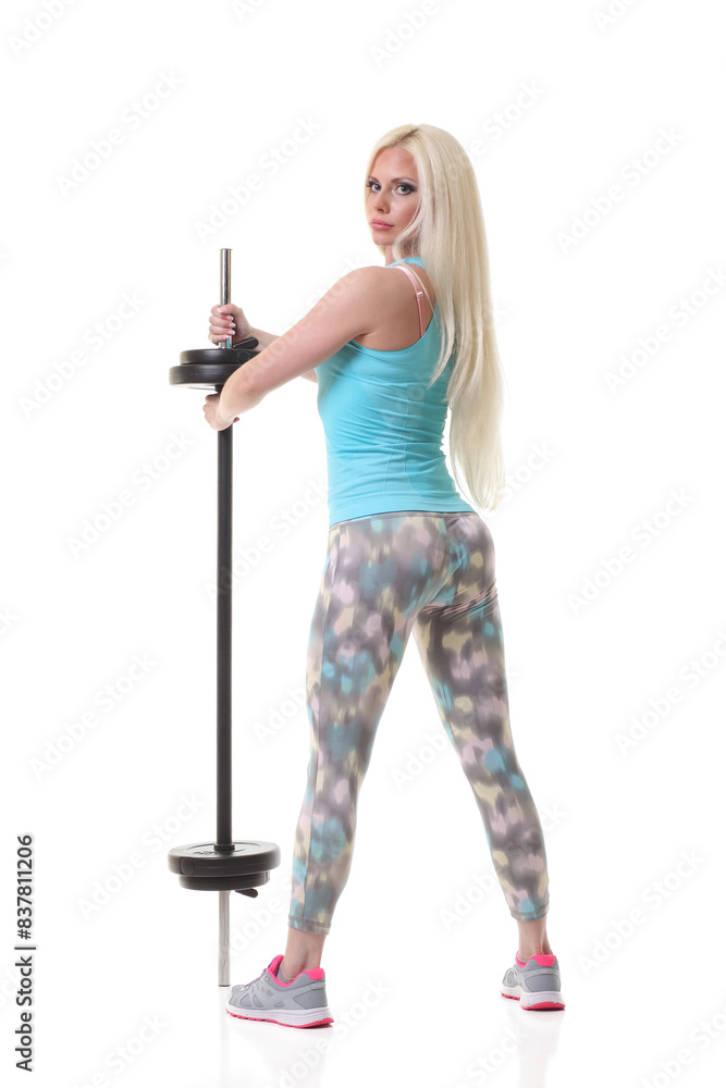 smiling sporty woman exercising with barbell smiling sporty woman exercising with barbell