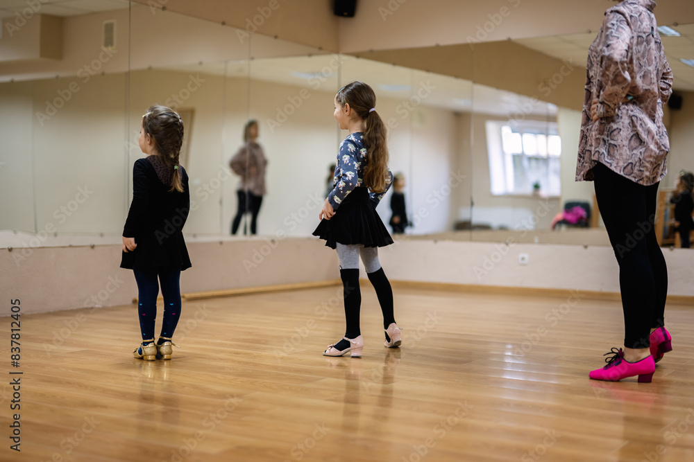 Young Girls Practicing Dance in Studio with Instructor