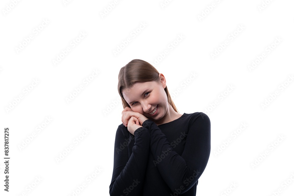 Portrait of a shy preteen girl of European appearance on a white background Portrait of a shy preteen girl of European appearance on a white background
