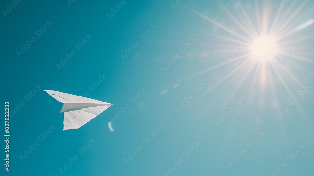 Paper Airplane Soaring in Clear Blue Sky Paper Airplane Soaring in Clear Blue Sky