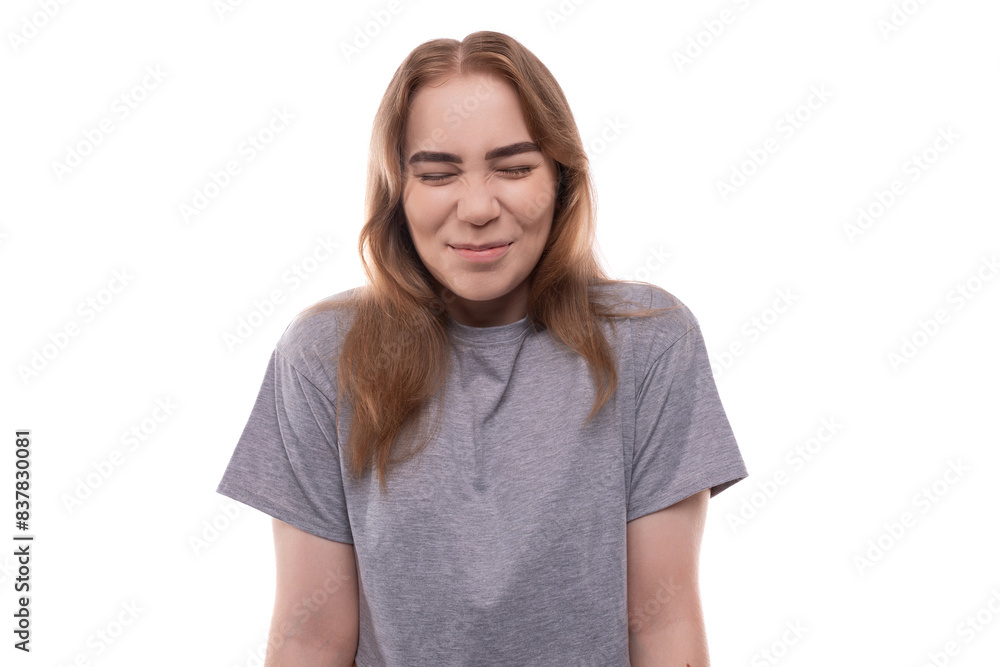 Teenage girl with light brown hair close-up on a white background Teenage girl with light brown hair close-up on a white background