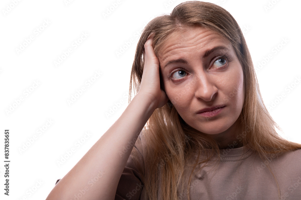 Blonde adult woman doubts and thinks Blonde adult woman doubts and thinks