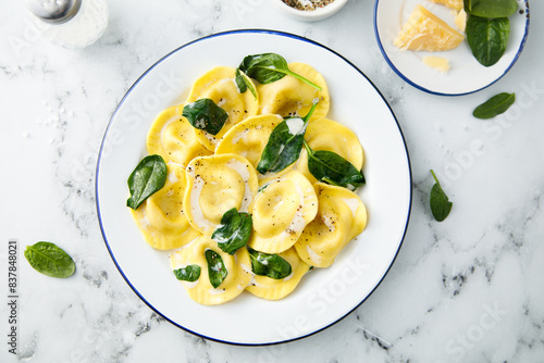 Traditional ravioli with spinach and cream