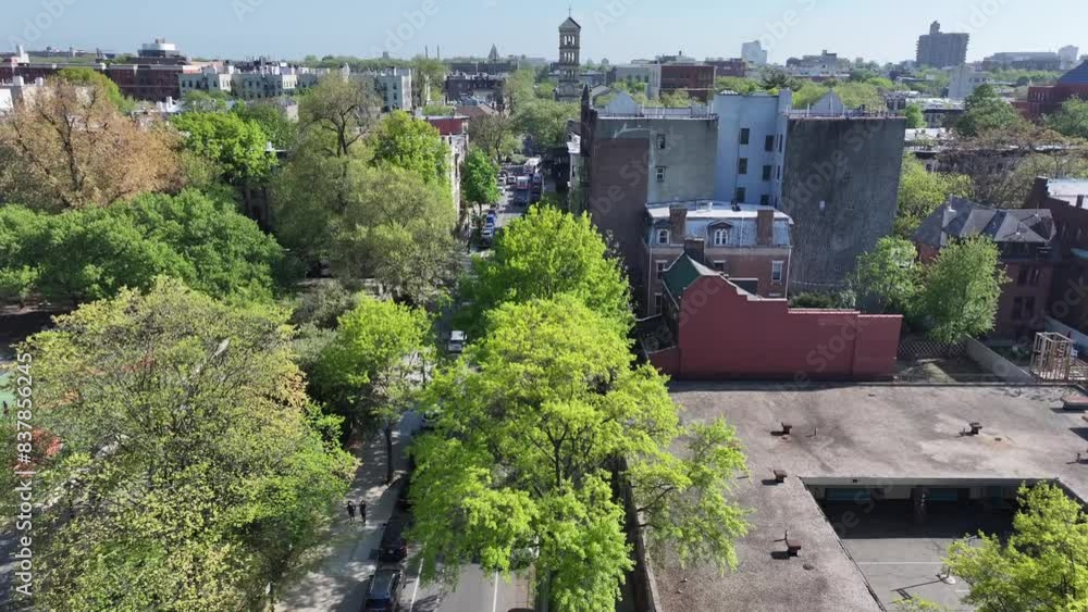 From an aerial view, Crown Heights in Brooklyn unfolds as a vibrant tapestry marked by rows of iconic brownstones and grand Victorian mansions, embodying the architectural richness of New York City. From an aerial view, Crown Heights in Brooklyn unfolds as a vibrant tapestry marked by rows of iconic brownstones and grand Victorian mansions, embodying the architectural richness of New York City.