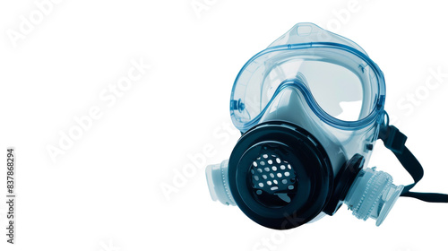 A gas mask with goggles resting on top of it © momina