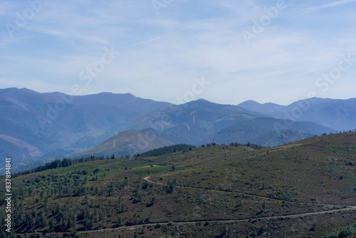 Landscape with morning fog, plains and mountains photo