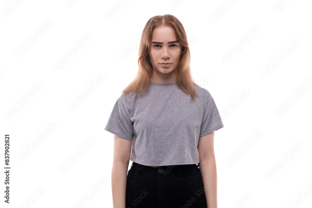 Headshot portrait of a teenage girl with light brown hair on a white background Headshot portrait of a teenage girl with light brown hair on a white background