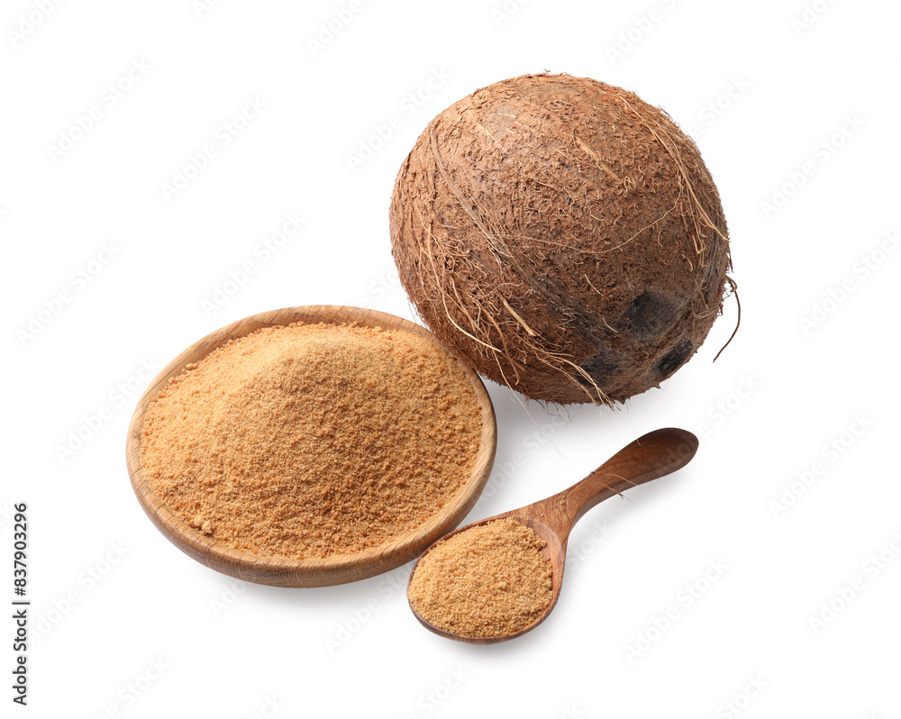 Coconut sugar in bowl, spoon and fruit isolated on white Coconut sugar in bowl, spoon and fruit isolated on white