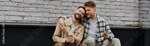 Two men enjoy a peaceful moment together outdoors. photo