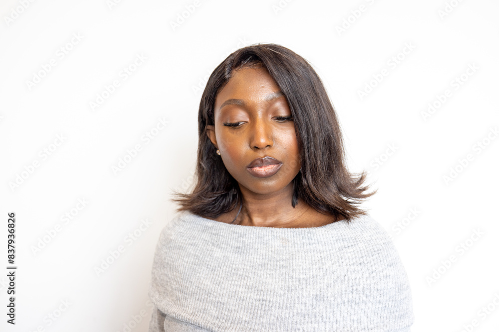 A peaceful and elegant woman, eyes closed, emanating a stylish and serene aura in a beautiful professional portrait A peaceful and elegant woman, eyes closed, emanating a stylish and serene aura in a beautiful professional portrait