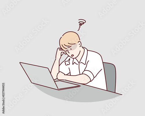 A tired worker is sitting at the table. Hand drawn style vector design illustrations.