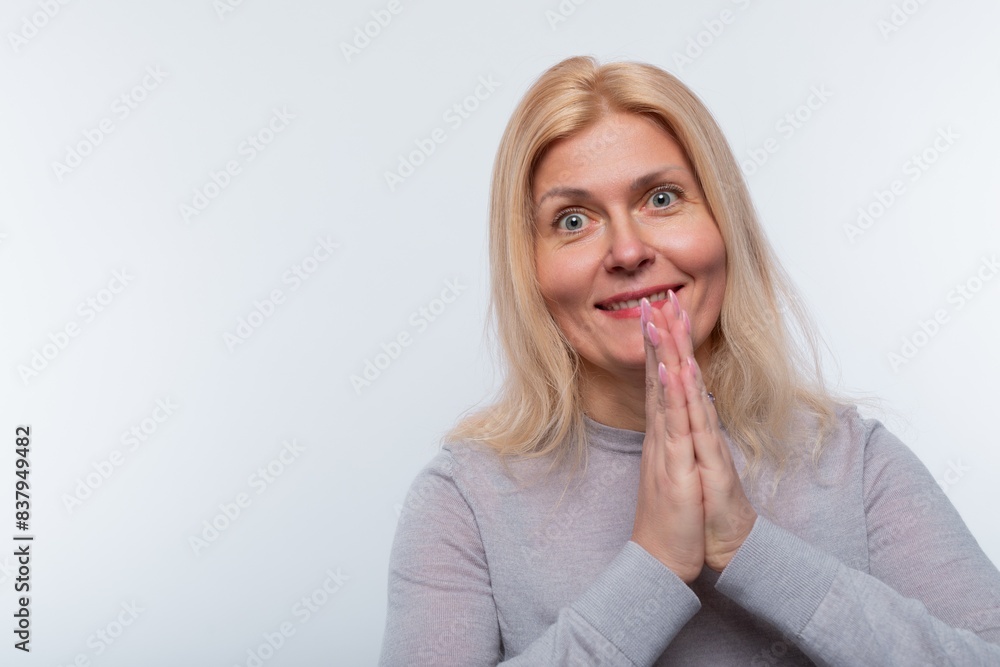 European woman with blond hair gives a friendly welcome on a white background European woman with blond hair gives a friendly welcome on a white background