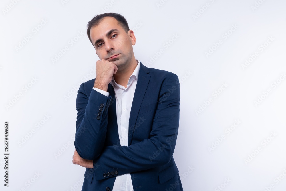 European 40 year old business man dressed in a jacket is bored European 40 year old business man dressed in a jacket is bored
