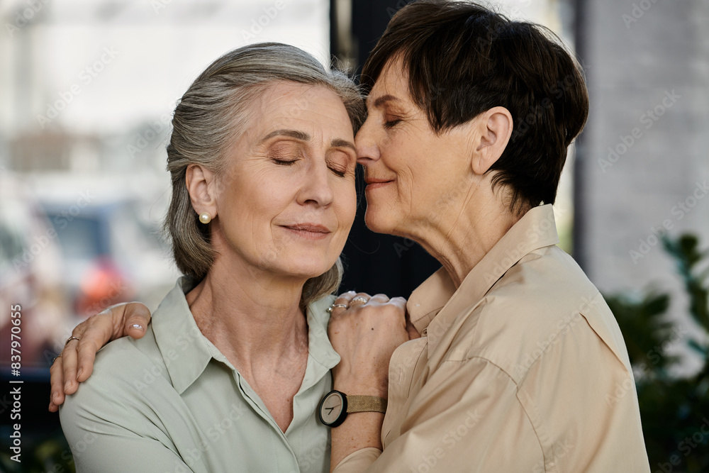 Two women posing in a heartwarming moment. Two women posing in a heartwarming moment.