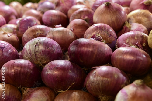 Onions at a vegetable stall at a market