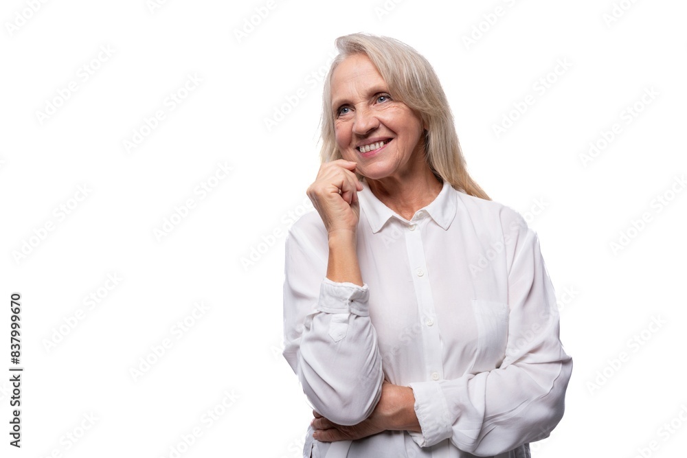 Retired business woman with gray hair feels joy and confidence Retired business woman with gray hair feels joy and confidence