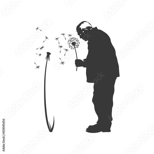 Silhouette of Man Blowing Dandelion Seeds: Wishful Thinking, Memory, Loss.