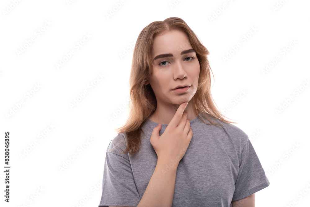 European teenager girl with blond hair and braces is upset European teenager girl with blond hair and braces is upset