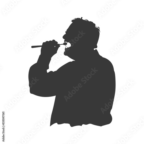 Silhouette of a man brushing teeth, facing left, isolated on white.