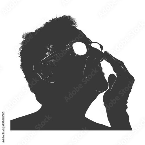 Silhouette of Man with Glasses Adjusting Nose, Contemplative Mood.