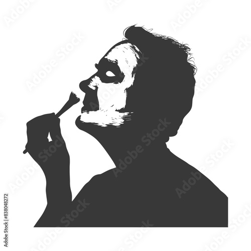 Silhouette Painter: Man Applying White Makeup with Brush, Dramatic Contrast