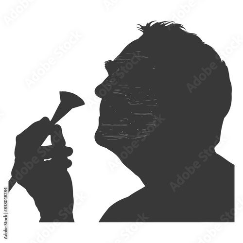 Silhouette of man smelling delicate conical instrument.