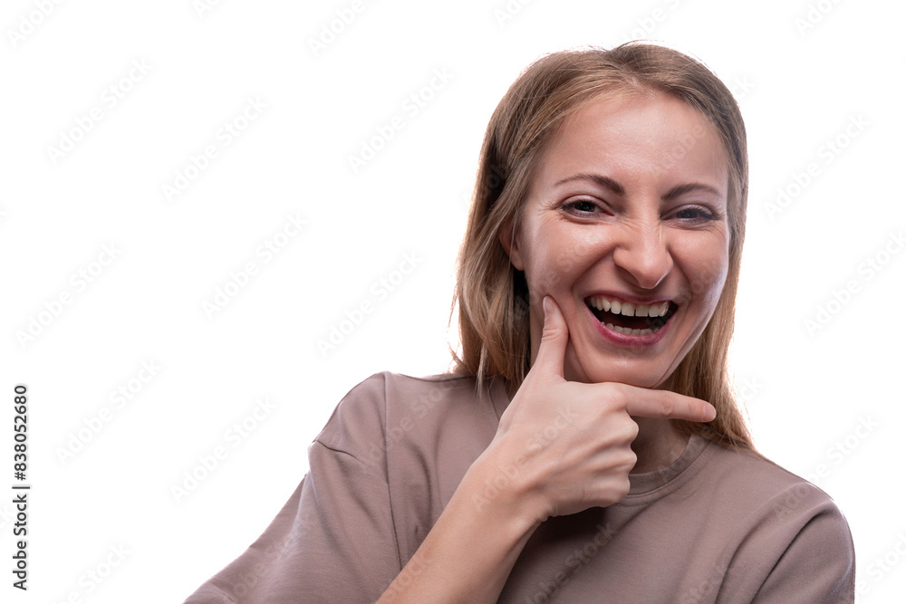 Blond adult woman experiencing joy Blond adult woman experiencing joy