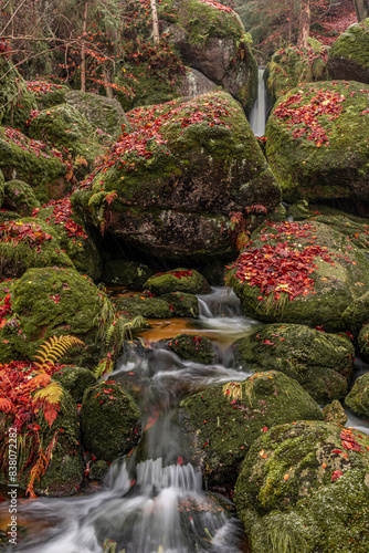 small waterfall on Maly Stolpich creek on autumn photo