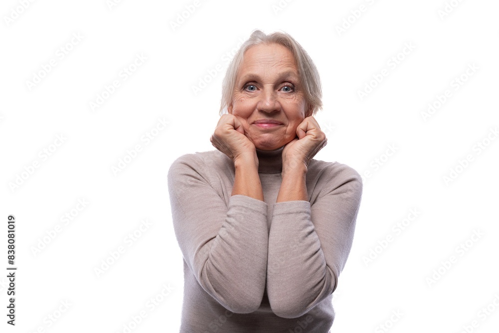 Portrait of a charming senior woman with gray hair Portrait of a charming senior woman with gray hair