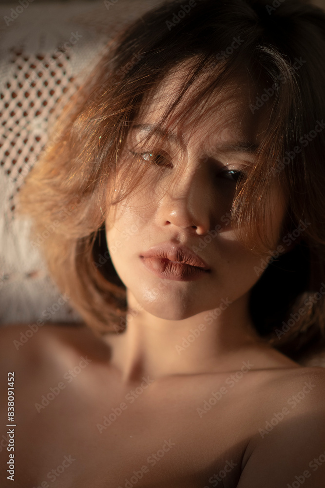 Portrait of young beautiful woman at the bed room. Portrait of young beautiful woman at the bed room.