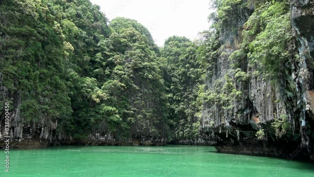 View of turquoise blue green coloured lagoon is a shallow body of water separated by a narrow landform such as reefs barrier or islands peninsulas or isthmuses 4k high resolution quality footage