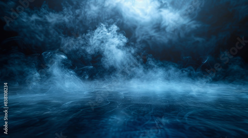 Abstract dark blue and white smoke or fog in an empty space  creating a mysterious and ethereal atmosphere  perfect for backgrounds and designs.