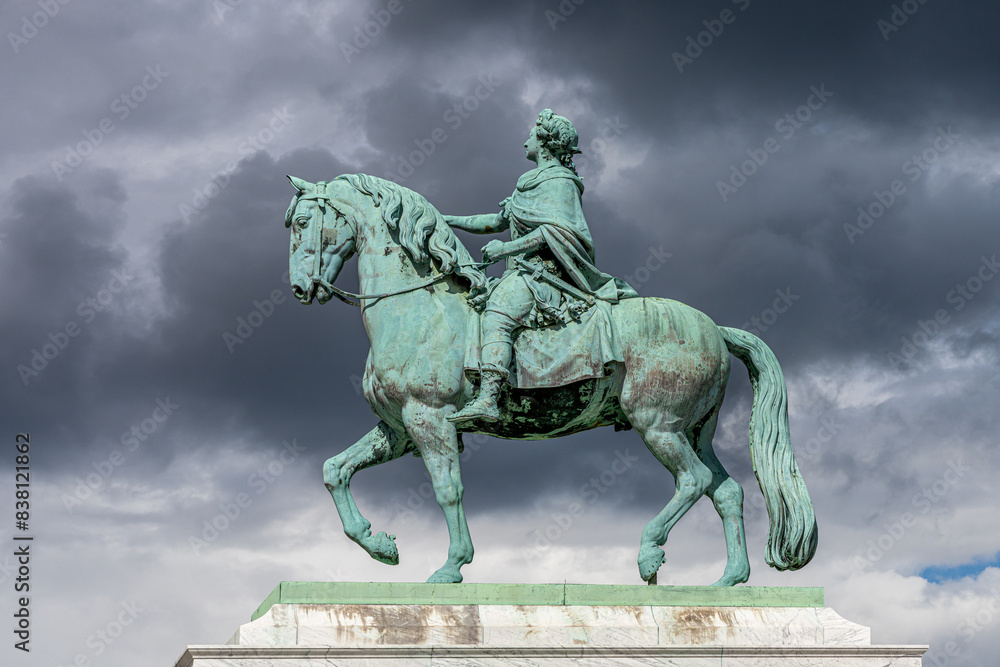 Fototapeta premium Historic equestrian statue in Copenhagen under dramatic sky