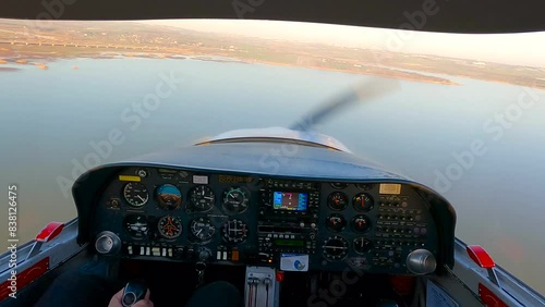 Pilot Flying Solo. Single Engine Propeller Training Aircraft Flight photo