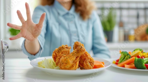 The hand and fried chicken photo