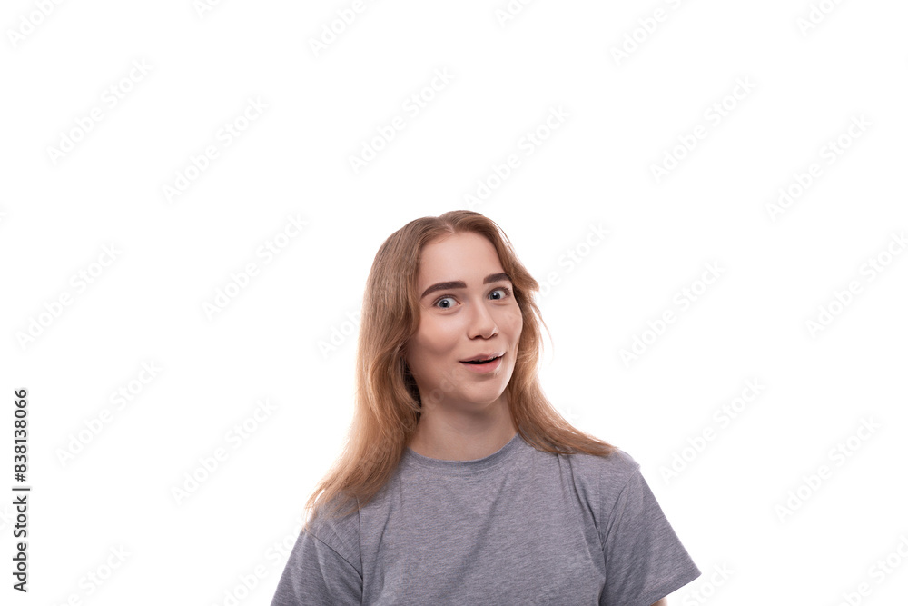 Headshot portrait of laughing teenage girl in gray t-shirt Headshot portrait of laughing teenage girl in gray t-shirt
