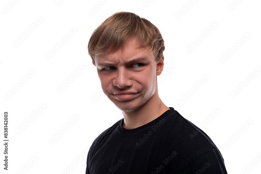 Caucasian guy with blond hair doubts and is offended Caucasian guy with blond hair doubts and is offended
