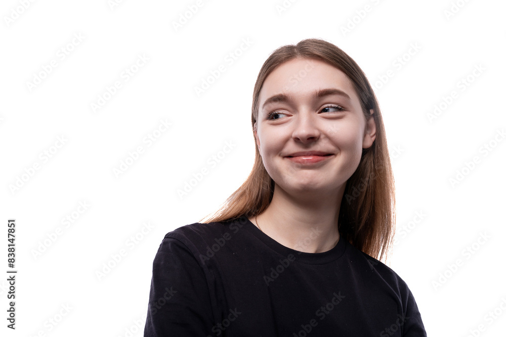 Close-up portrait of a Caucasian 15 year old girl with brown hair on a background with copy space Close-up portrait of a Caucasian 15 year old girl with brown hair on a background with copy space