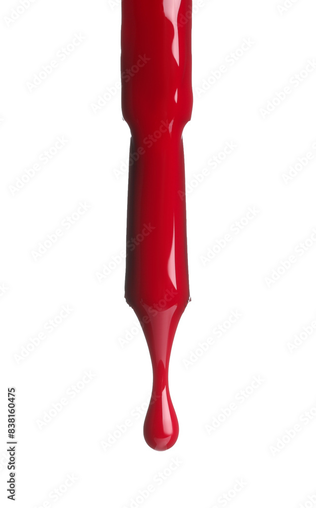 Red nail polish dripping from brush isolated on white Red nail polish dripping from brush isolated on white